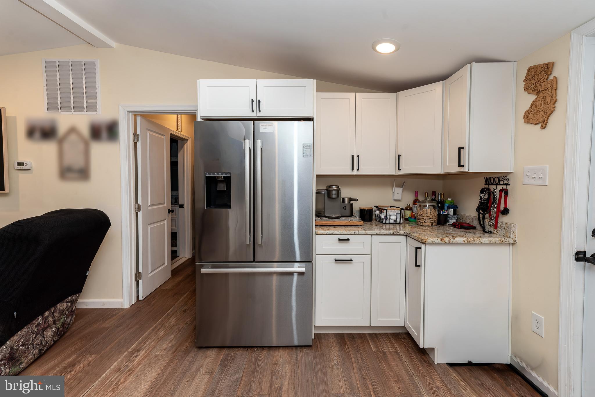 997 Williamstown Road Franklinville, NJ 08322 - Photo 14 of 62 a kitchen with stainless steel appliances granite countertop a refrigerator and a stove top oven
