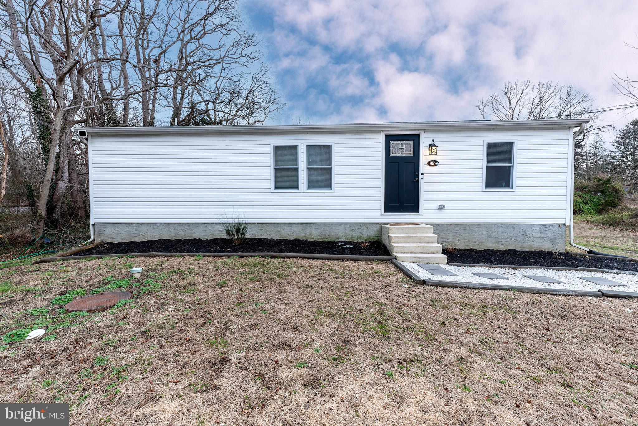 997 Williamstown Road Franklinville, NJ 08322 - Photo 3 of 62 a view of a back yard of the house