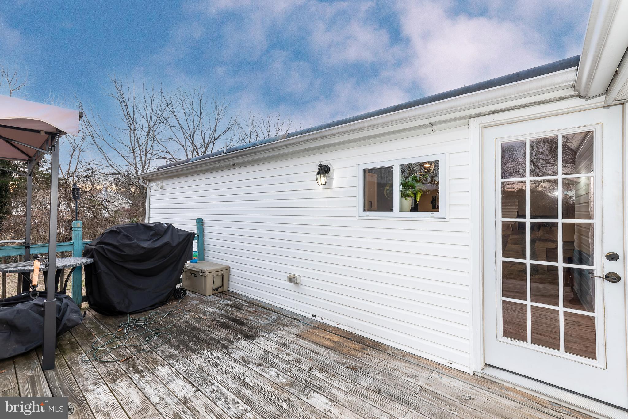997 Williamstown Road Franklinville, NJ 08322 - Photo 36 of 62 a view of a deck with barbeque grill and wooden floor