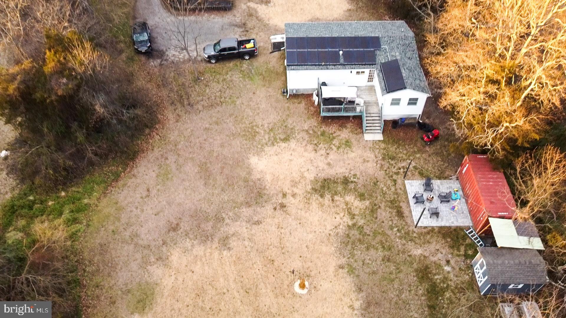 997 Williamstown Road Franklinville, NJ 08322 - Photo 61 of 62 a backyard of a house with table and chairs