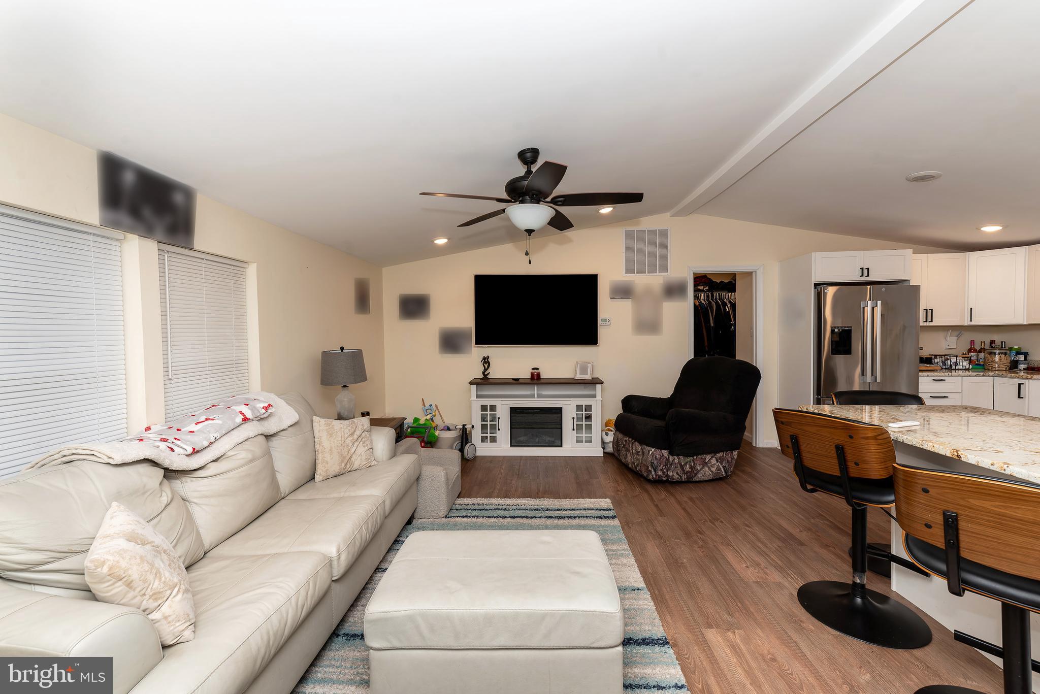 997 Williamstown Road Franklinville, NJ 08322 - Photo 8 of 62 a living room with furniture and a flat screen tv