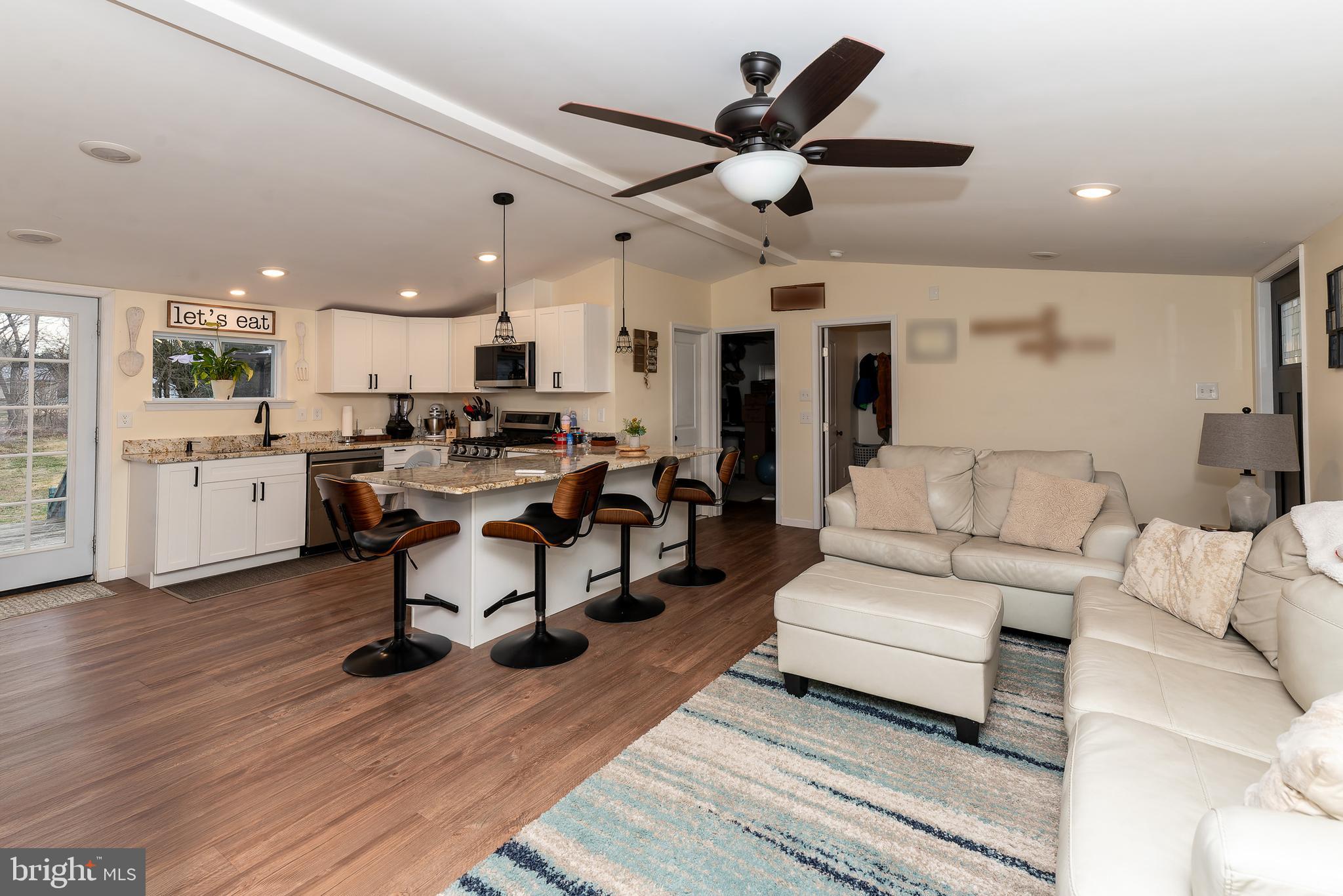 997 Williamstown Road Franklinville, NJ 08322 - Photo 10 of 62 a living room with furniture and kitchen view