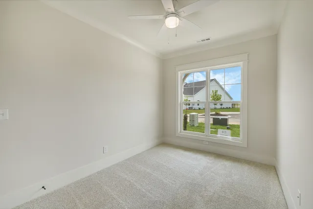 an empty room that has a window