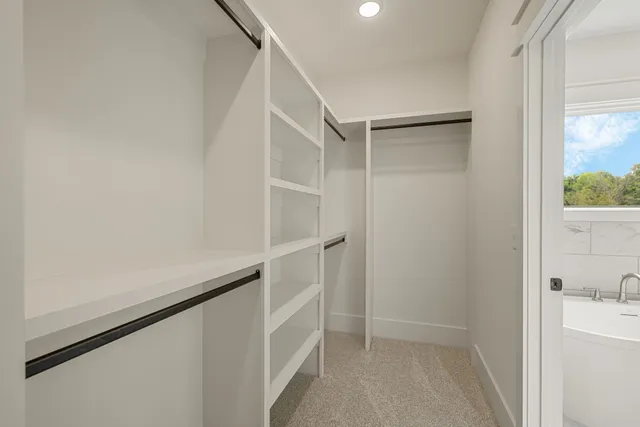 a view of an empty walk in closet