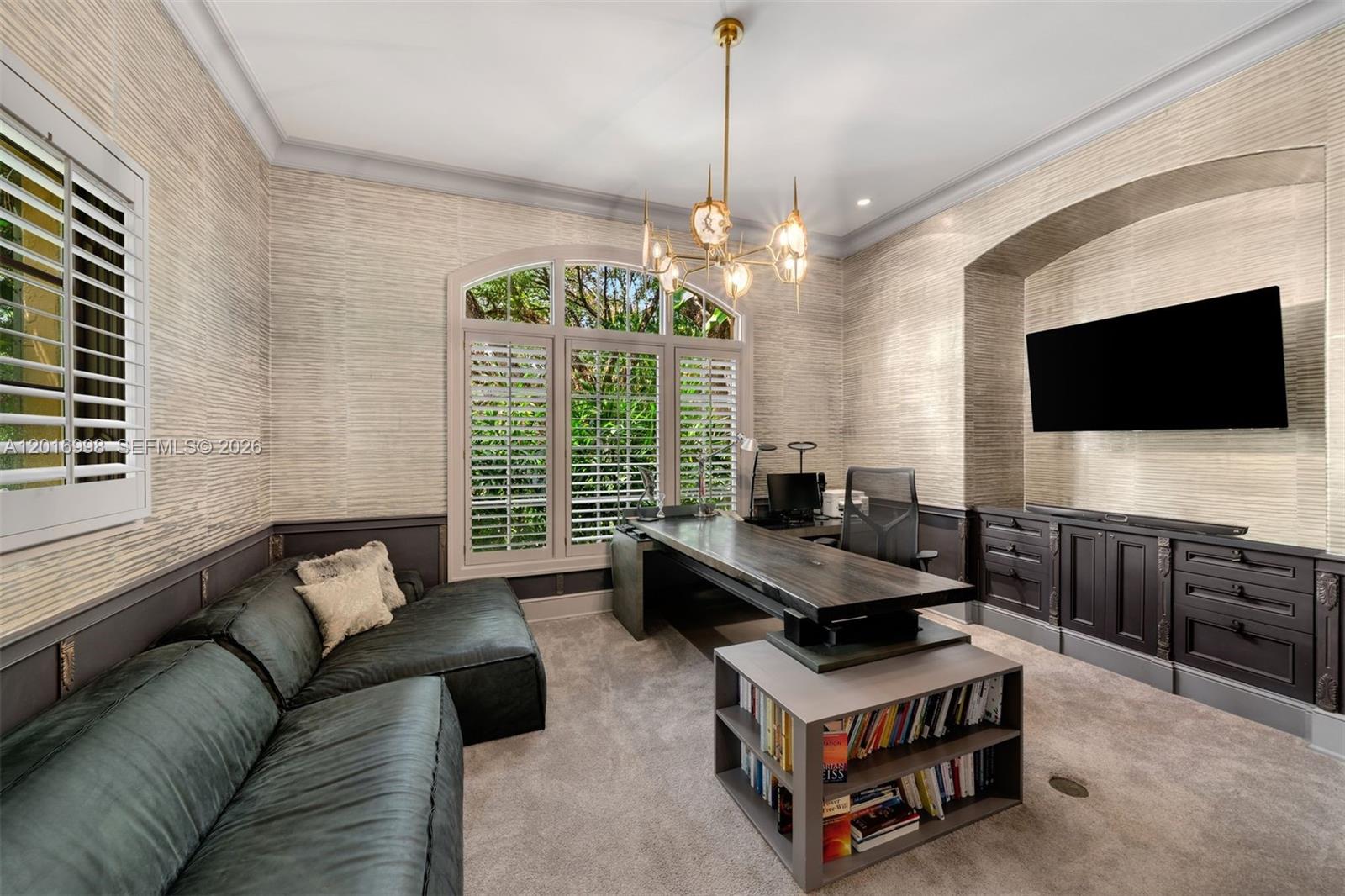 4790 Southwest 78th Street Miami, FL 33143 - Photo 20 of 33 a living room with furniture a flat screen tv and a window