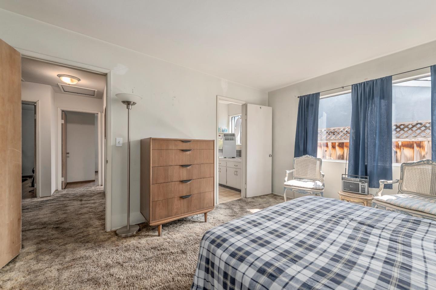 1651 Salisbury Drive San Jose, CA 95124 - Photo 15 of 22 a bedroom with a dresser and a mirror