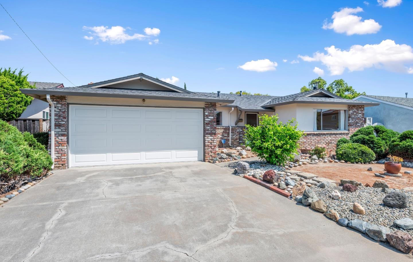 1651 Salisbury Drive San Jose, CA 95124 - Photo 21 of 22 a front view of a house with yard