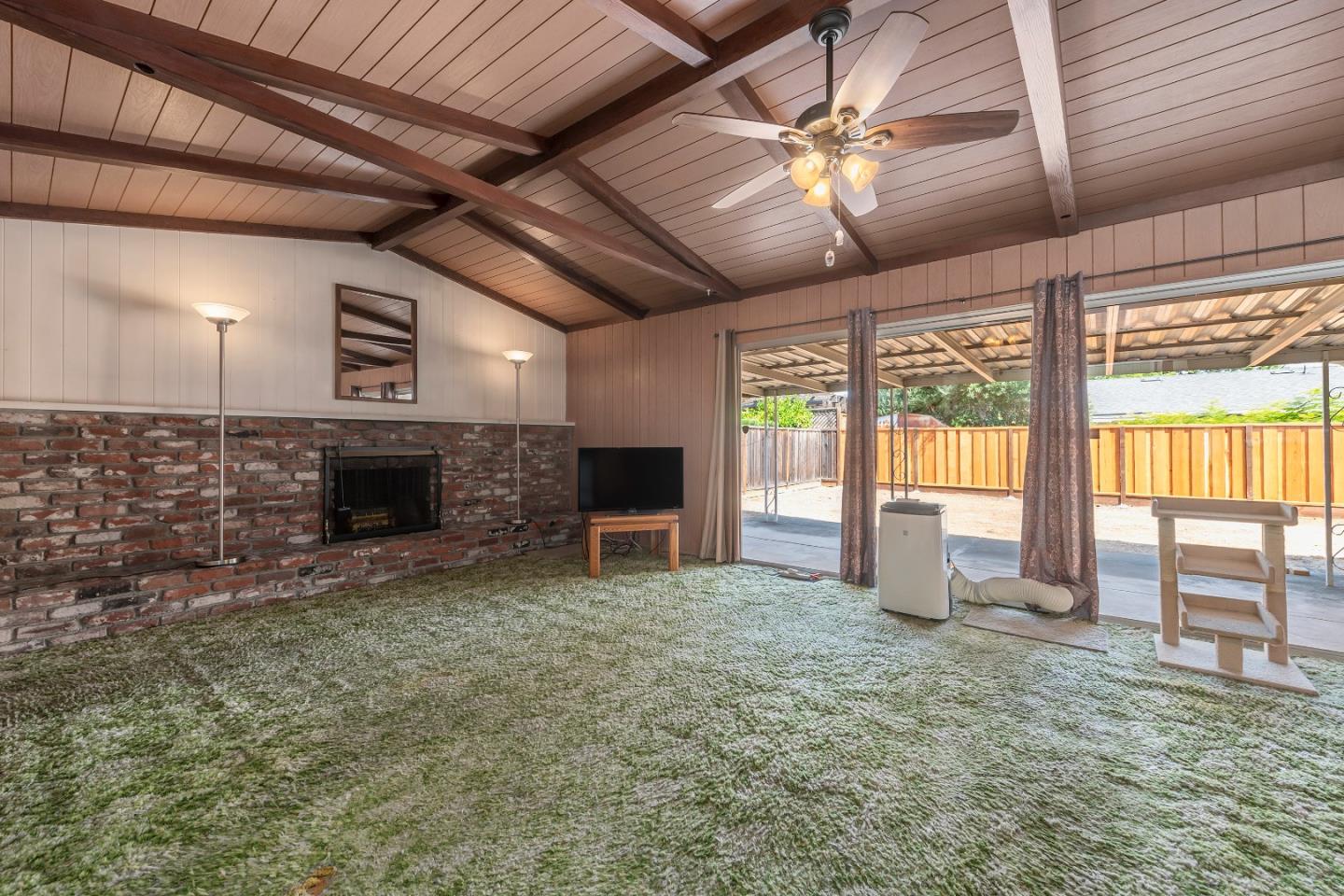 1651 Salisbury Drive San Jose, CA 95124 - Photo 9 of 22 a living room with furniture and a fireplace