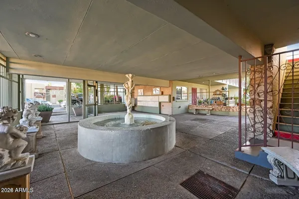 a view of a swimming pool with a patio