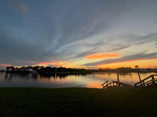 a bedroom with a bed and a television in it