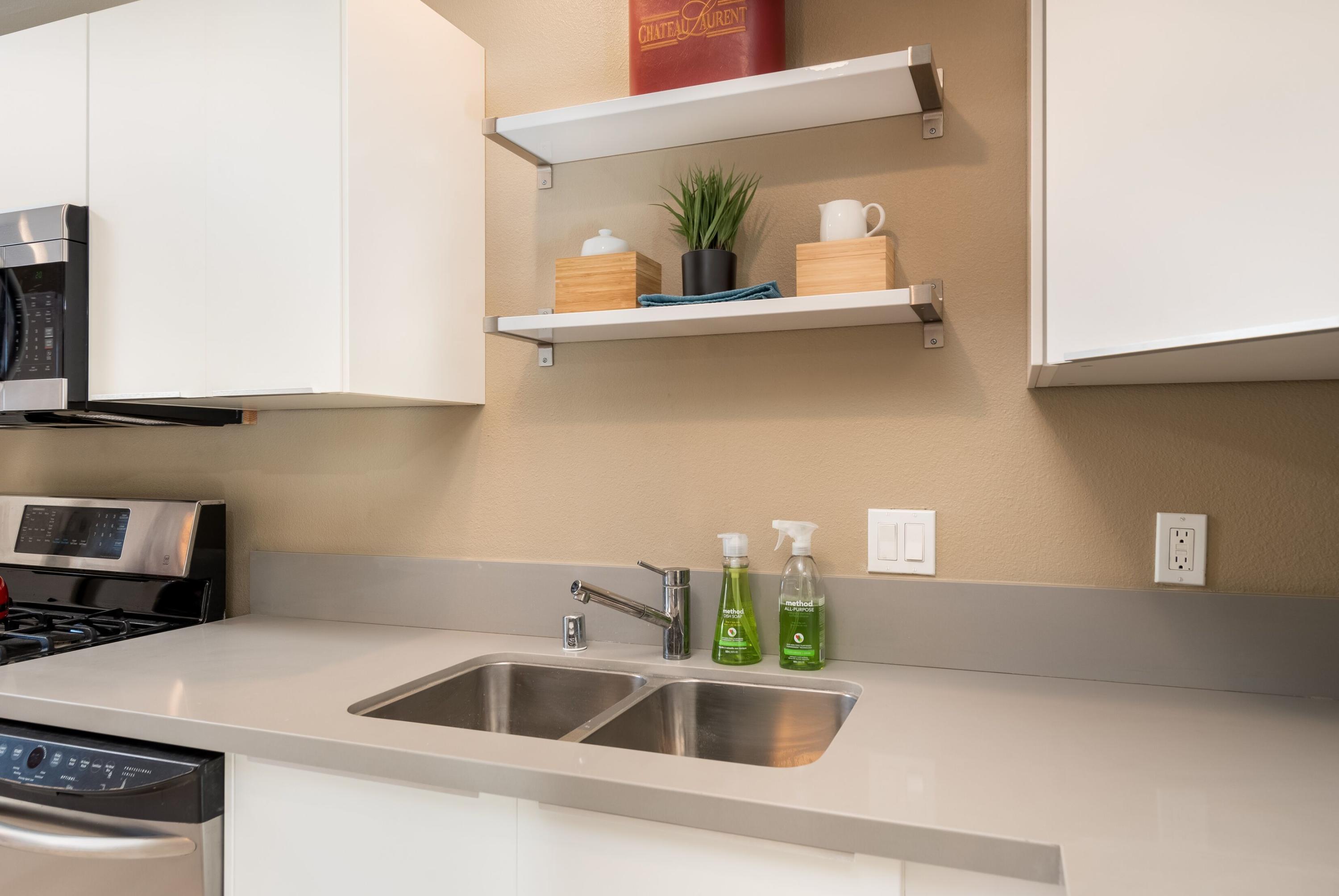 68195 Terrace Road Cathedral City, CA 92234 - Photo 13 of 33 a kitchen with a sink and cabinets