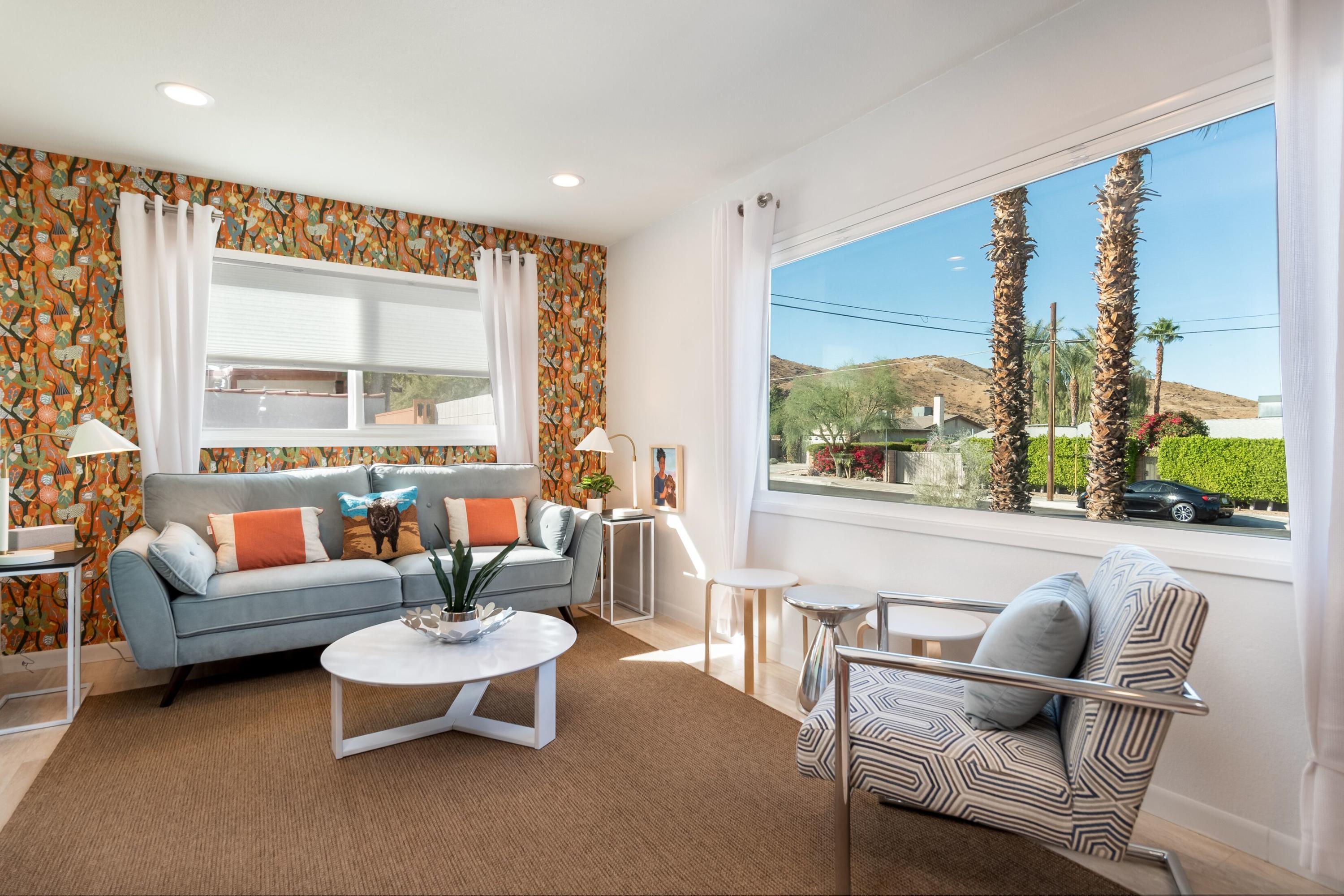 68195 Terrace Road Cathedral City, CA 92234 - Photo 3 of 33 a living room with furniture and a large window
