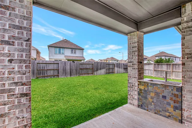 a view of a porch with a yard