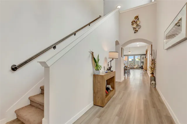 a view of living room with furniture and wooden floor