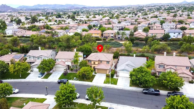 an aerial view of a city with lots of residential buildings