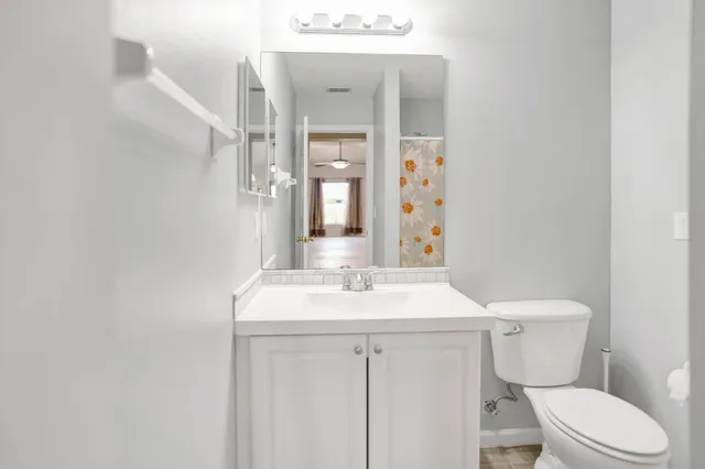 a view of a kitchen with sink and stainless steel appliances