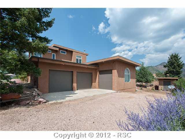 5610 Timpa Road Cascade, CO 80809 - Photo 16 of 16 The home has a two car oversized garage (18'deep x 25' wide), a single car 17'x 12' garage with workshop and small storage shed.