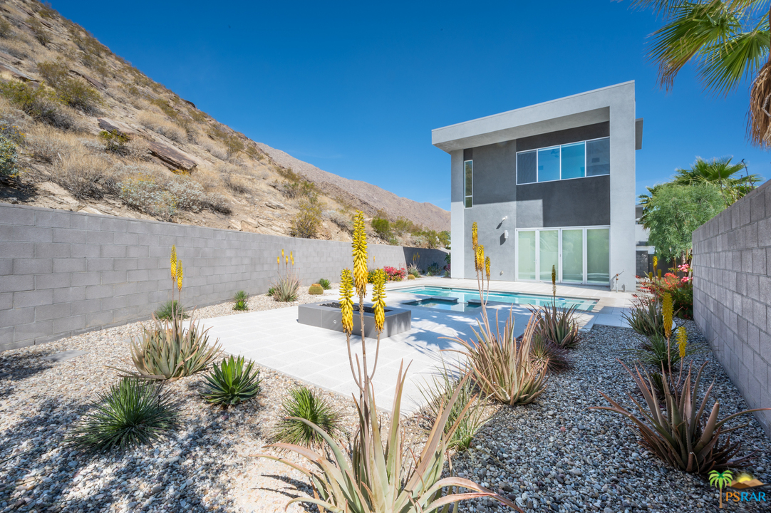 1521 South Belardo Road Palm Springs, CA 92264 - Photo 11 of 37 a view of swimming pool with outdoor seating