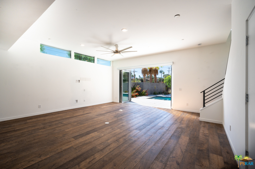 1521 South Belardo Road Palm Springs, CA 92264 - Photo 16 of 37 a view of a livingroom with wooden floor
