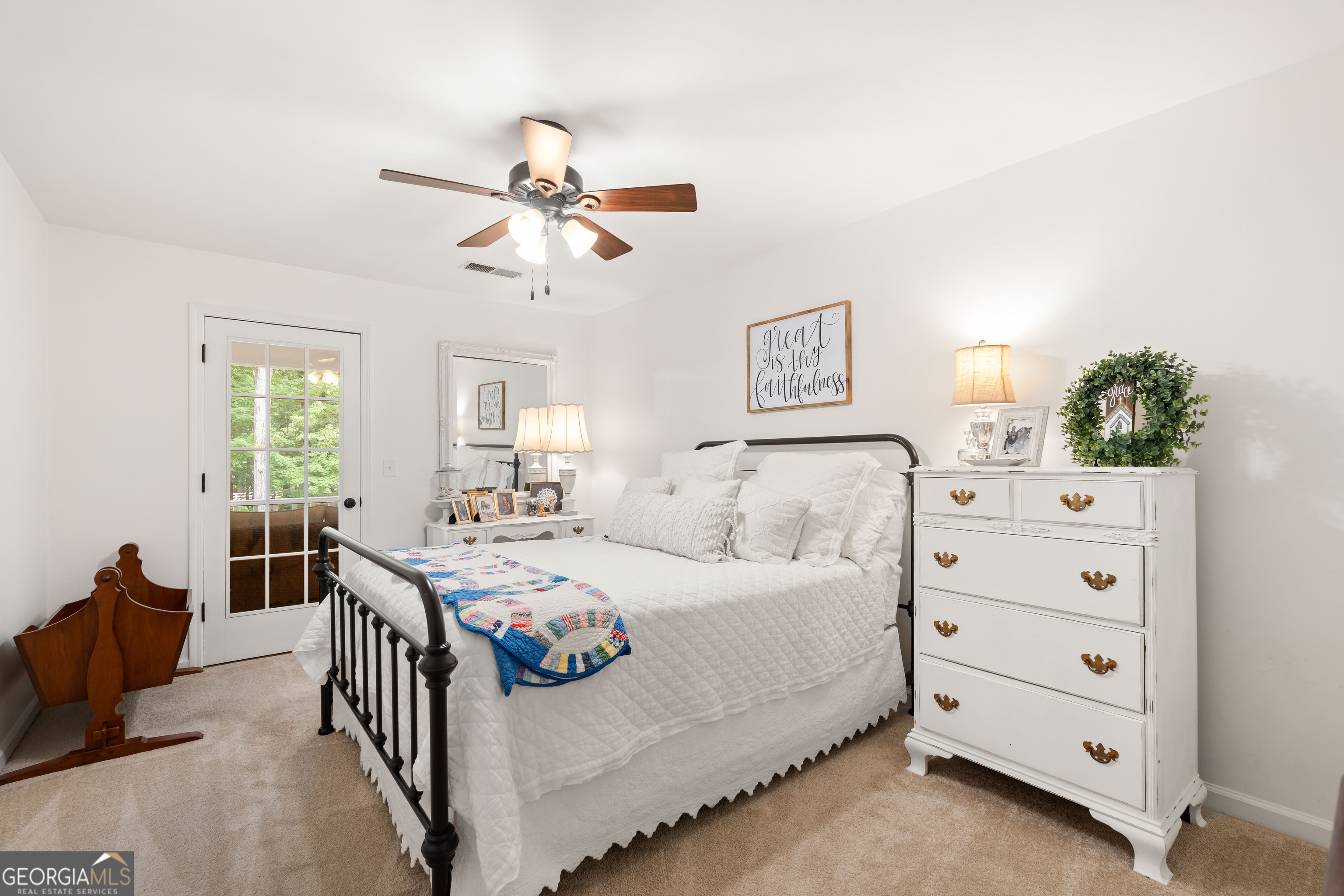 836 Oak Grove Road Carrollton, GA 30117 - Photo 38 of 50 a bedroom with a bed and a dresser