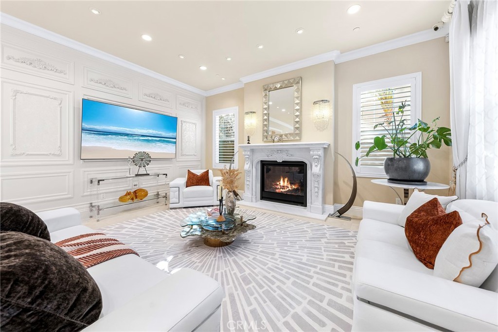 123 Calderon Irvine, CA 92618 - Photo 14 of 74 a living room with furniture and a fireplace