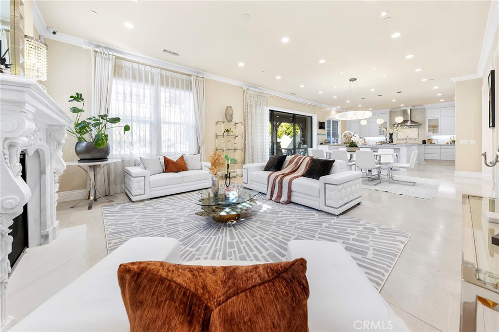 123 Calderon Irvine, CA 92618 - Photo 15 of 74 a living room with furniture fireplace and a table