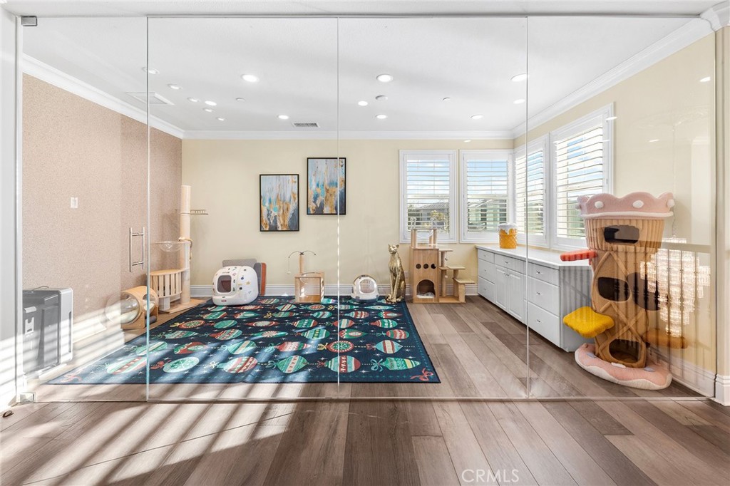 123 Calderon Irvine, CA 92618 - Photo 33 of 74 a living room with a couch and a table with wooden floor