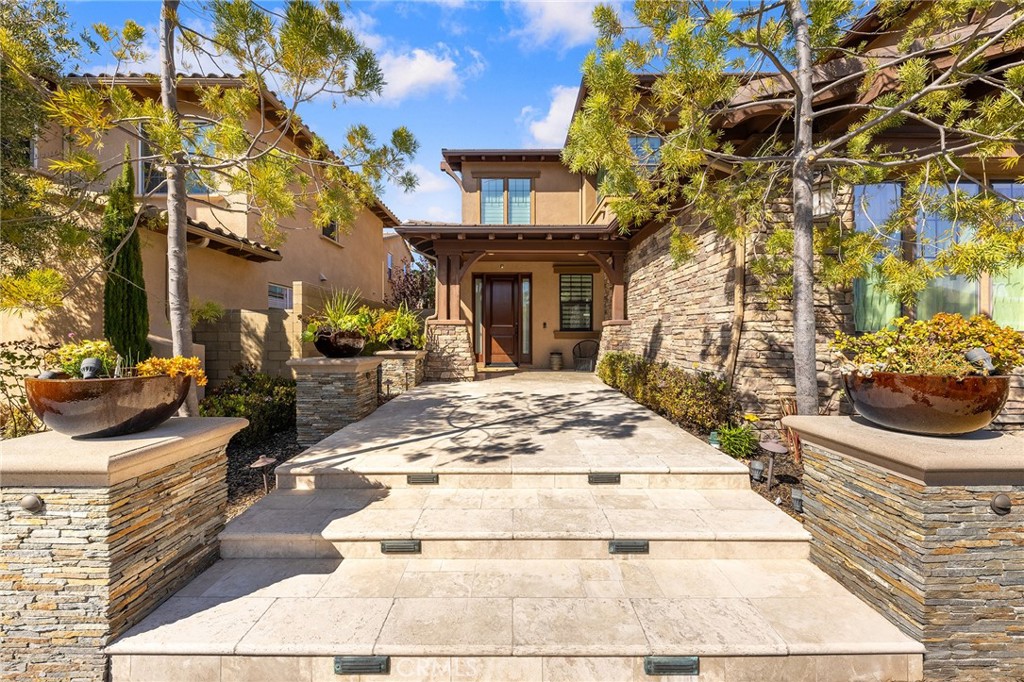 123 Calderon Irvine, CA 92618 - Photo 4 of 74 a view of a building with many windows