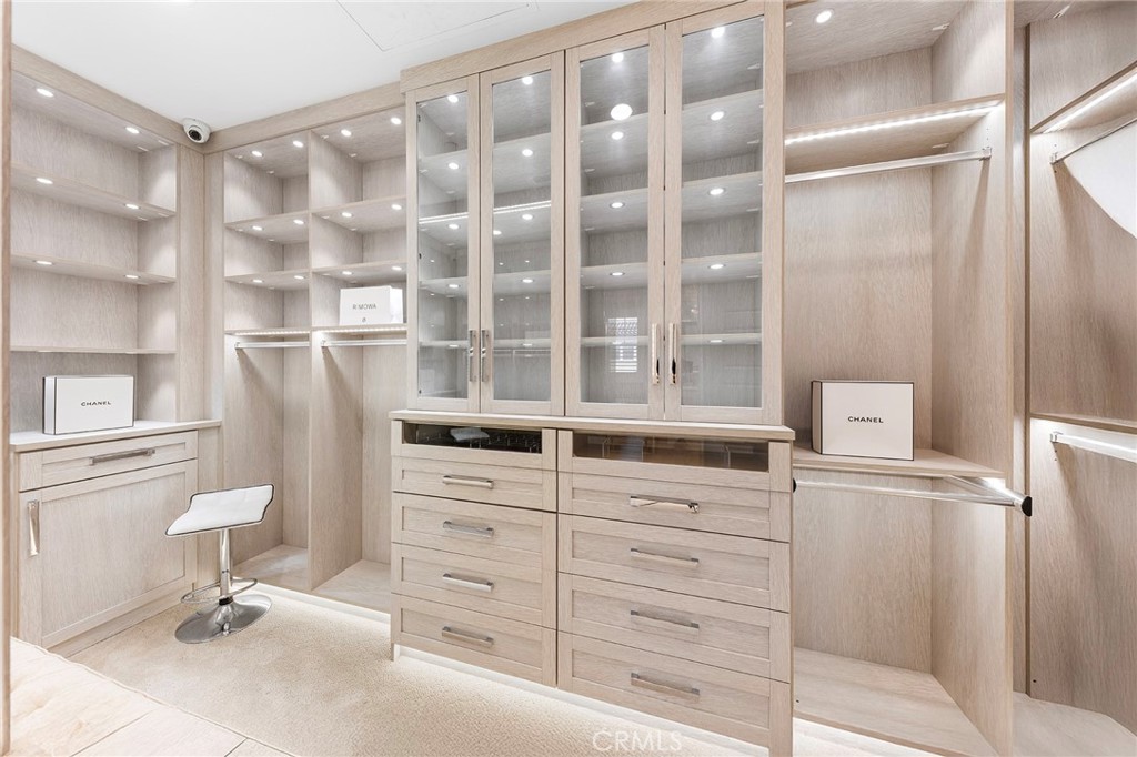 123 Calderon Irvine, CA 92618 - Photo 43 of 74 a kitchen with a refrigerator and white cabinets