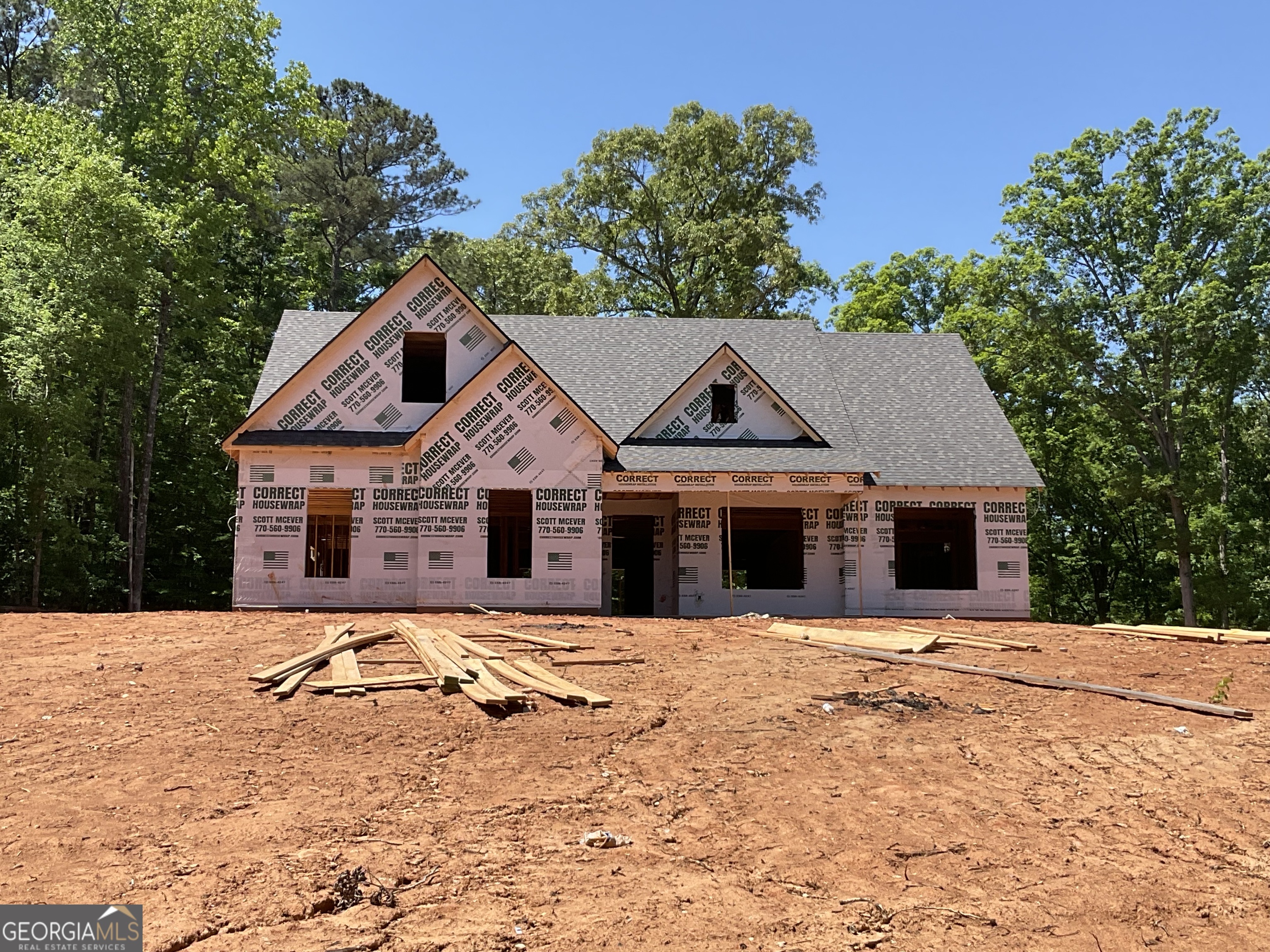 103 Crestview Lane Jackson, GA 30233 - Photo 1 of 6 a front view of a house with a yard