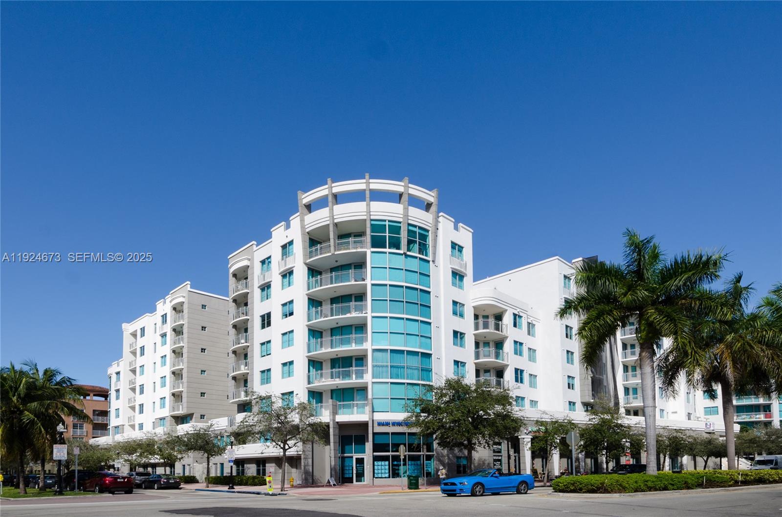 110 Washington Avenue, Unit 1822 Miami Beach, FL 33139 - Photo 11 of 17 a front view of a building with palm trees
