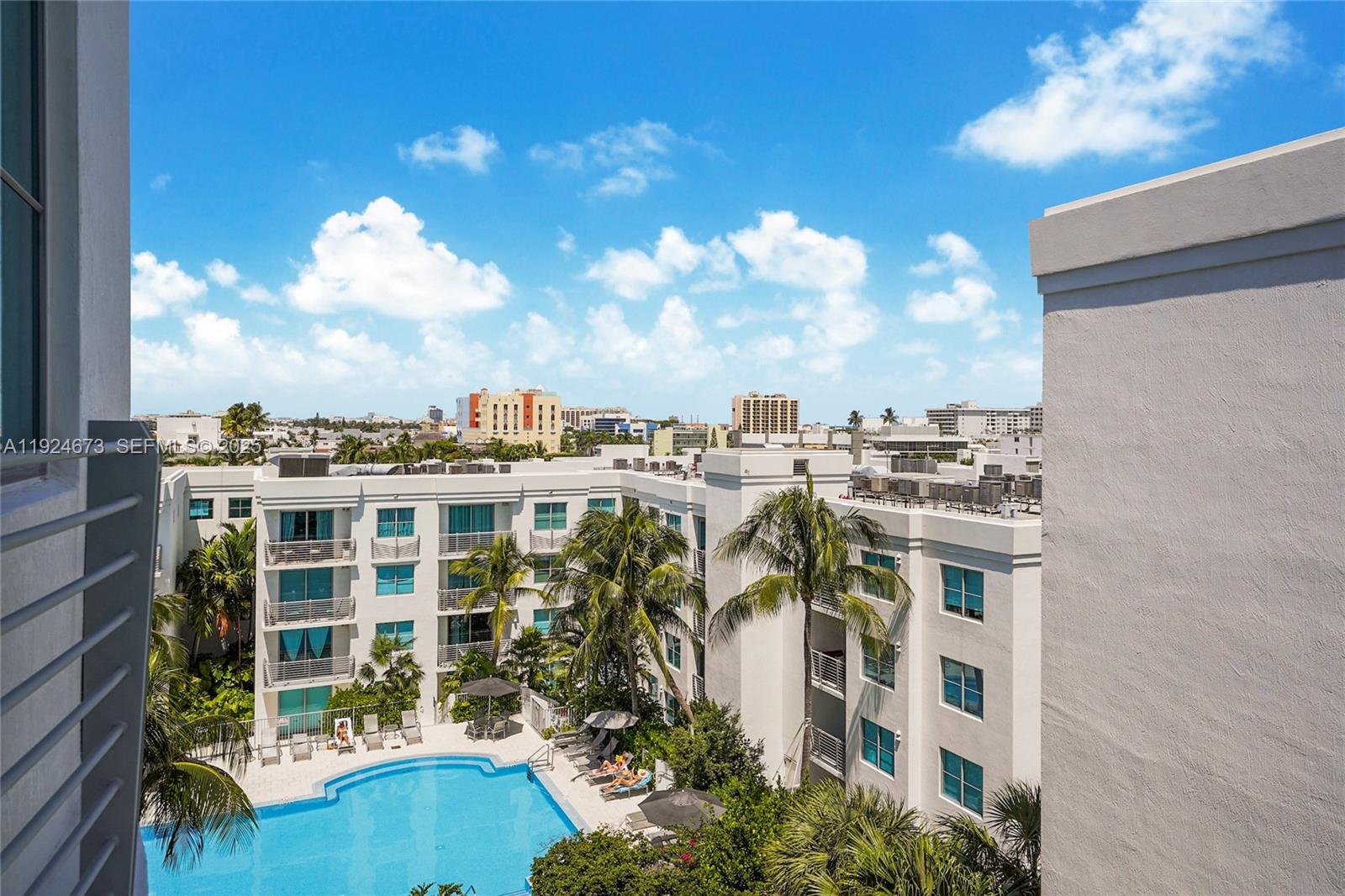 110 Washington Avenue, Unit 1822 Miami Beach, FL 33139 - Photo 10 of 17 a view of a lake with building