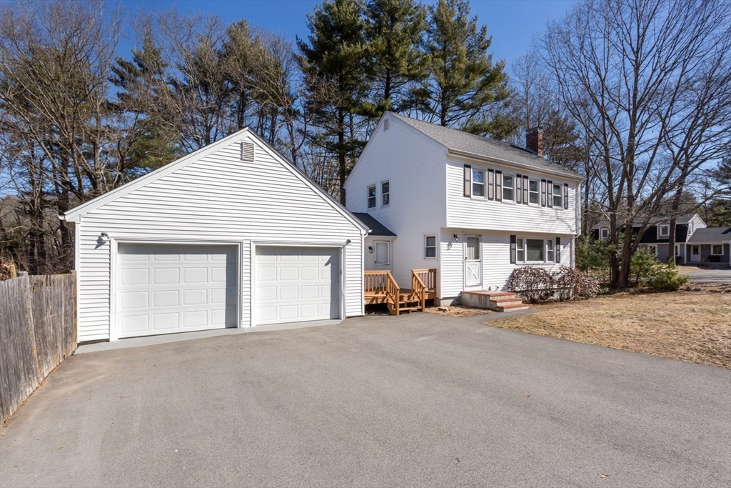 12 Sargent Lane Franklin, MA 02038 - Photo 2 of 40 a view of a car park in front of house