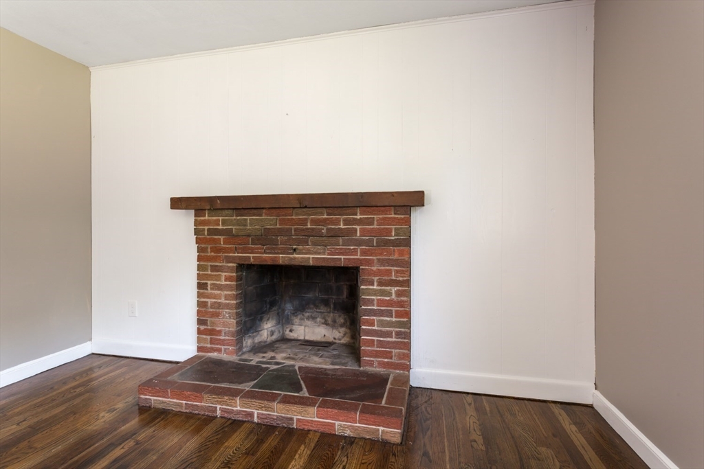 12 Sargent Lane Franklin, MA 02038 - Photo 10 of 40 a living room with a fireplace