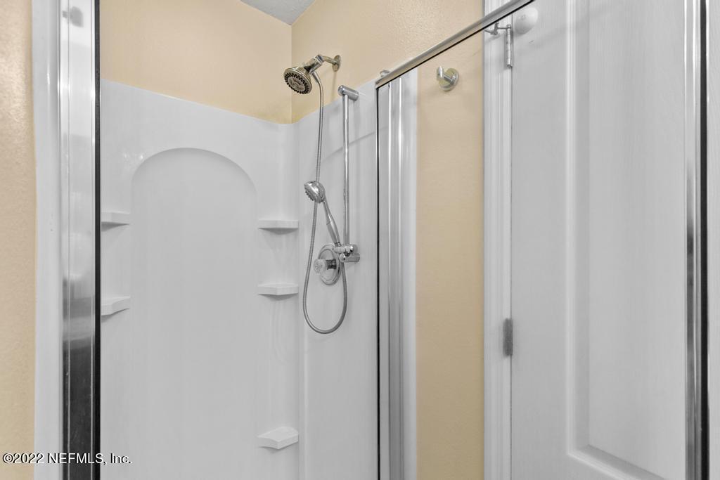 2527 Eisner Drive Jacksonville, FL 32218 - Photo 16 of 29 a bathroom with a shower
