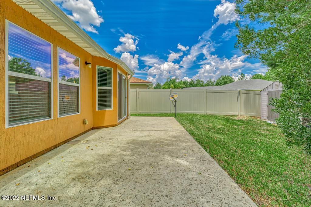 2527 Eisner Drive Jacksonville, FL 32218 - Photo 22 of 29 a view of a house with a backyard
