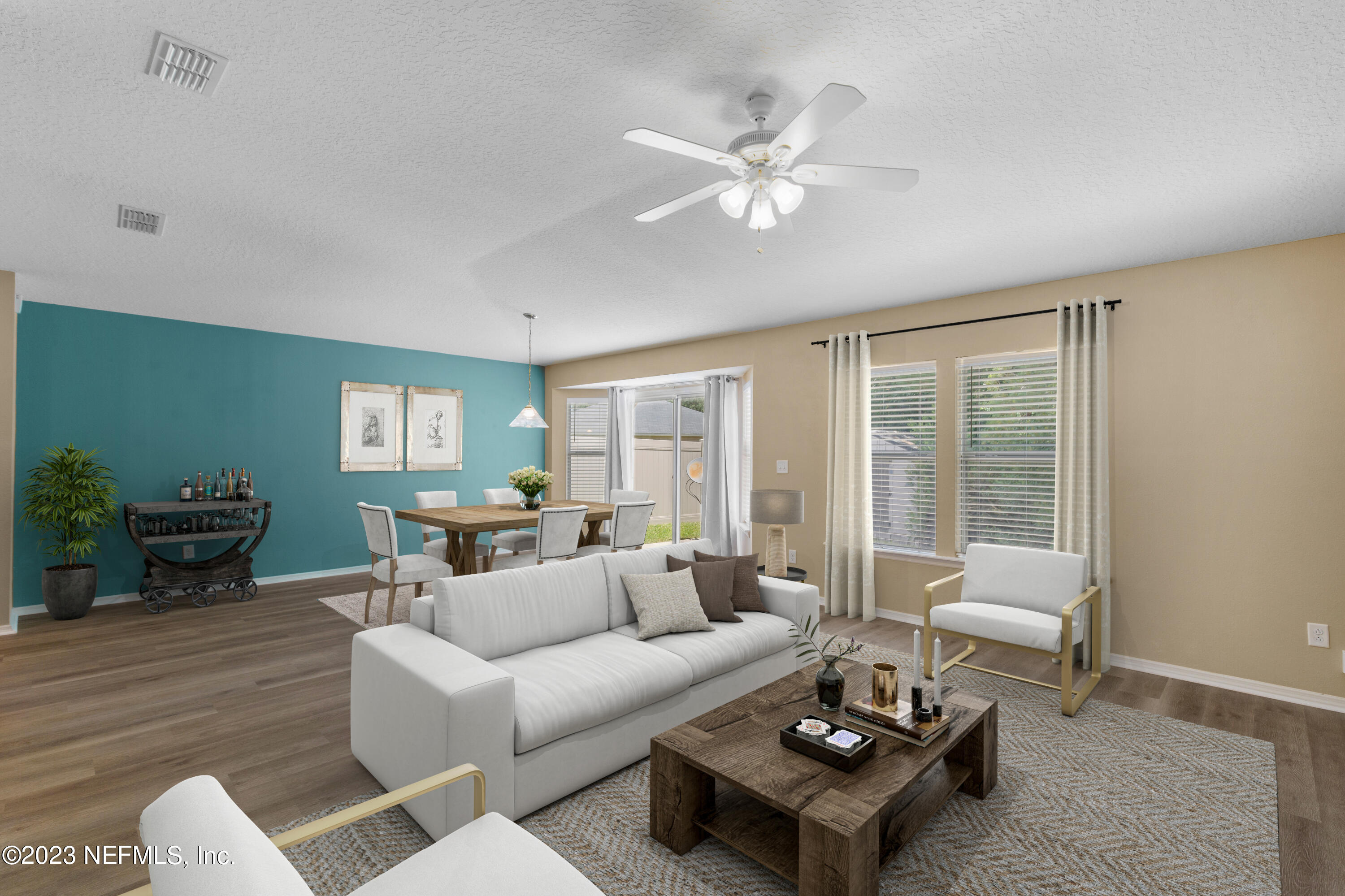 2527 Eisner Drive Jacksonville, FL 32218 - Photo 5 of 29 a living room with furniture and a large window