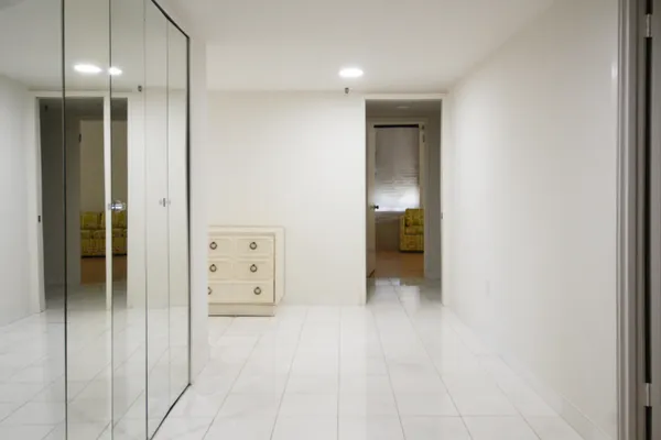 an empty room with cabinet