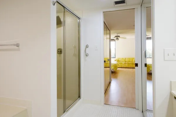 a en suite bathroom with a sink and a shower