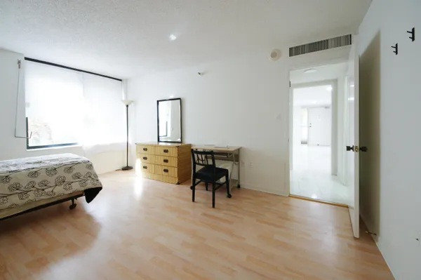 a bathroom with a sink toilet tub and shower