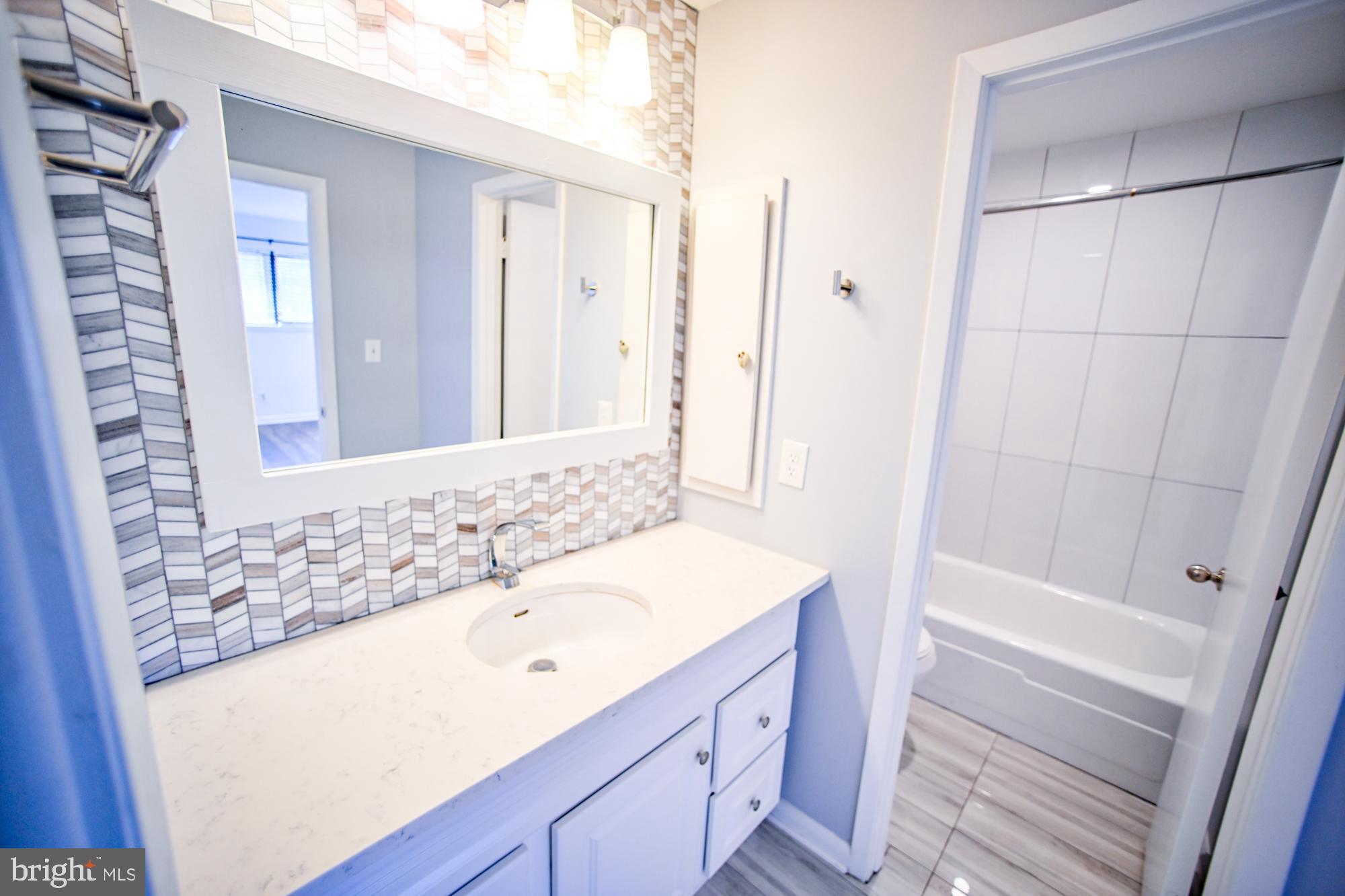 733 Stoney Spring Drive Baltimore, MD 21210 - Photo 28 of 53 Primary bedroom en-suite bathroom