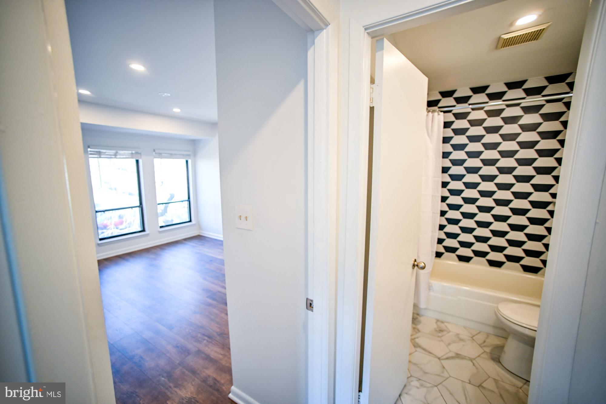 733 Stoney Spring Drive Baltimore, MD 21210 - Photo 37 of 53 Hallway bathroom