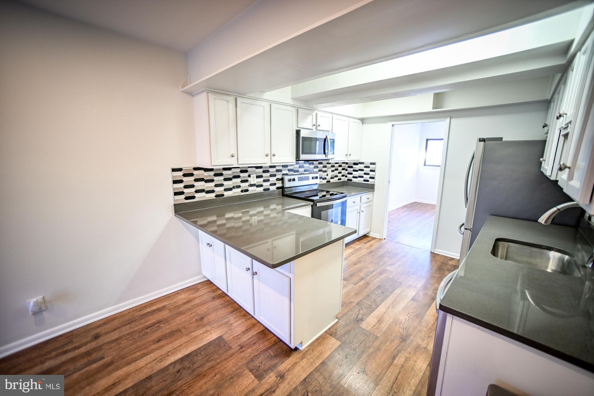 733 Stoney Spring Drive Baltimore, MD 21210 - Photo 6 of 53 Gourmet eat-in kitchen w/ granite counters