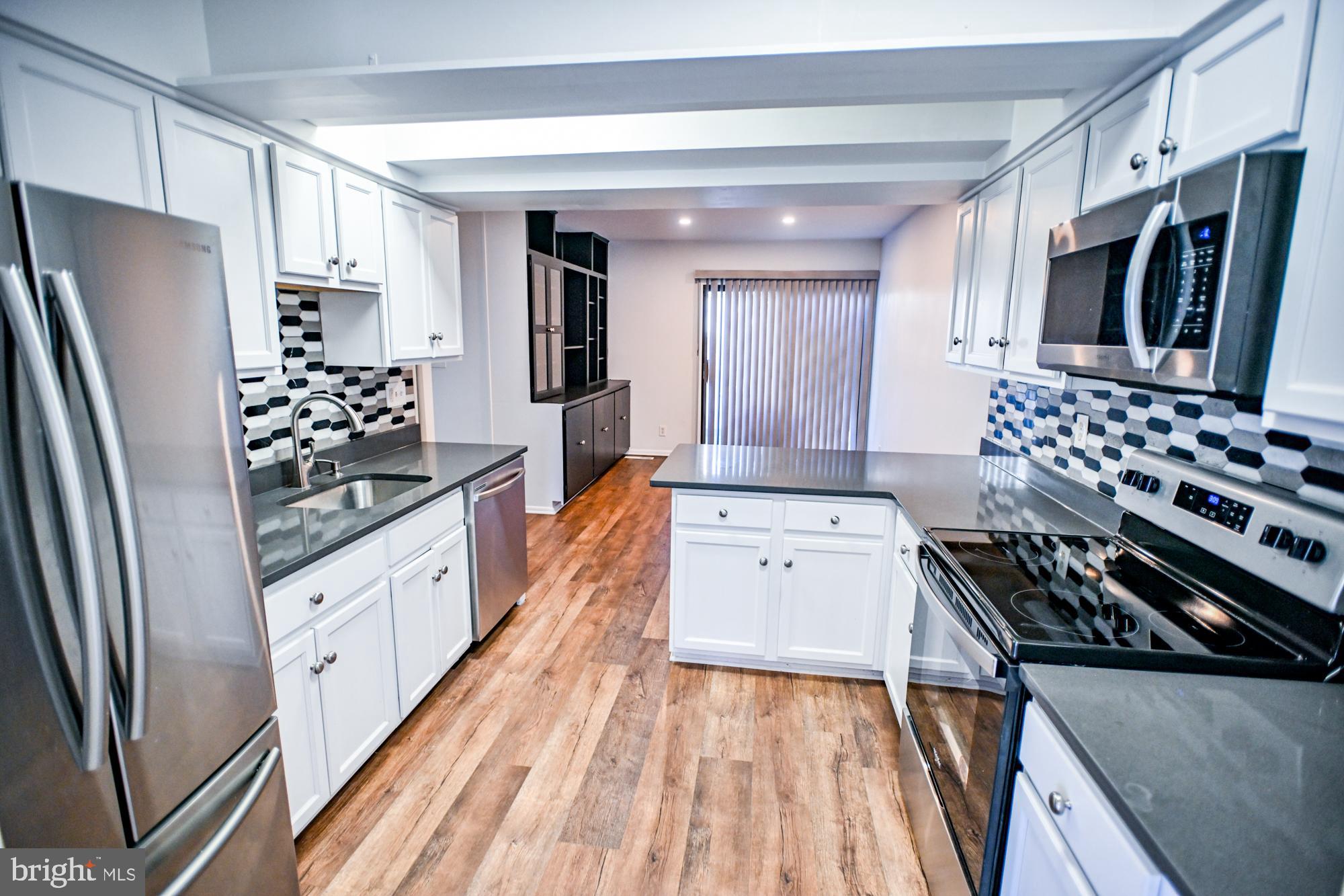 733 Stoney Spring Drive Baltimore, MD 21210 - Photo 7 of 53 Gourmet eat-in kitchen w/ granite counters