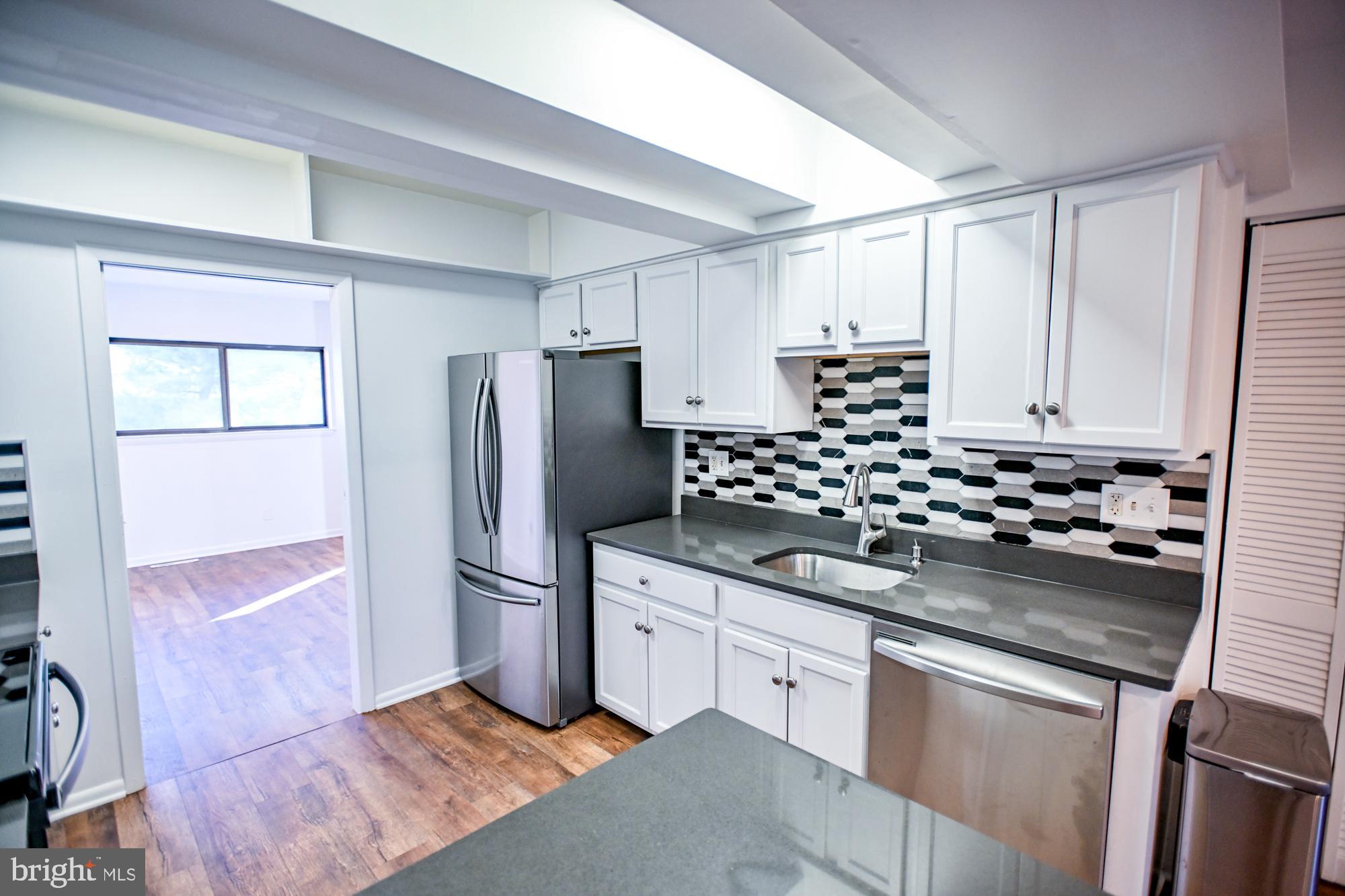 733 Stoney Spring Drive Baltimore, MD 21210 - Photo 10 of 53 Gourmet eat in kitchen w/ stainless appliances