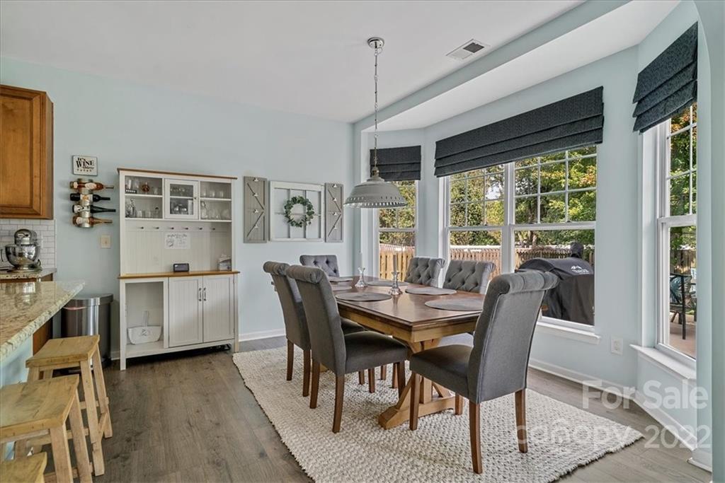 244 Sand Paver Way, Unit 60 Fort Mill, SC 29708 - Photo 12 of 42 a view of a dining room with furniture window and outside view