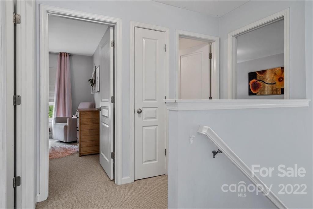 244 Sand Paver Way, Unit 60 Fort Mill, SC 29708 - Photo 29 of 42 a view of a hallway with closet
