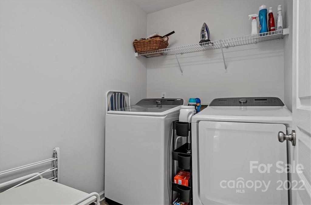 244 Sand Paver Way, Unit 60 Fort Mill, SC 29708 - Photo 30 of 42 a utility room with dryer and washer