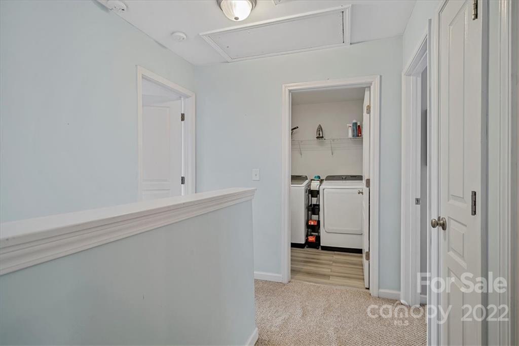 244 Sand Paver Way, Unit 60 Fort Mill, SC 29708 - Photo 34 of 42 a view of hallway with wooden floor