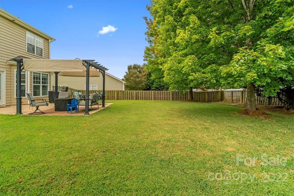244 Sand Paver Way, Unit 60 Fort Mill, SC 29708 - Photo 37 of 42 a view of a house with a big yard